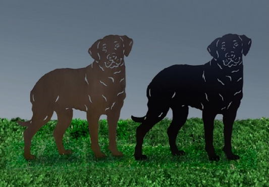 Two dog silhouettes, one brown and one black, standing on grass with a blue background.