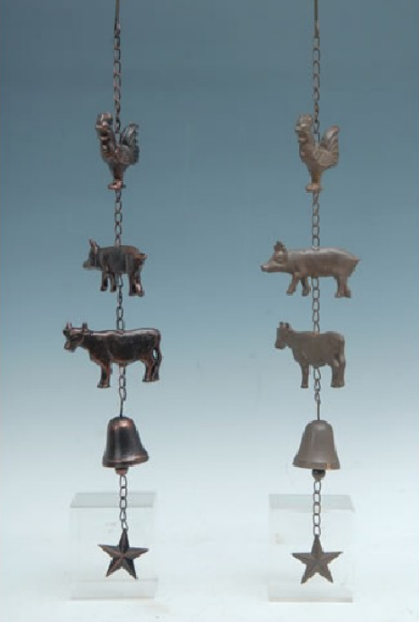 Decorative wind chime with animal and star elements on a light blue background