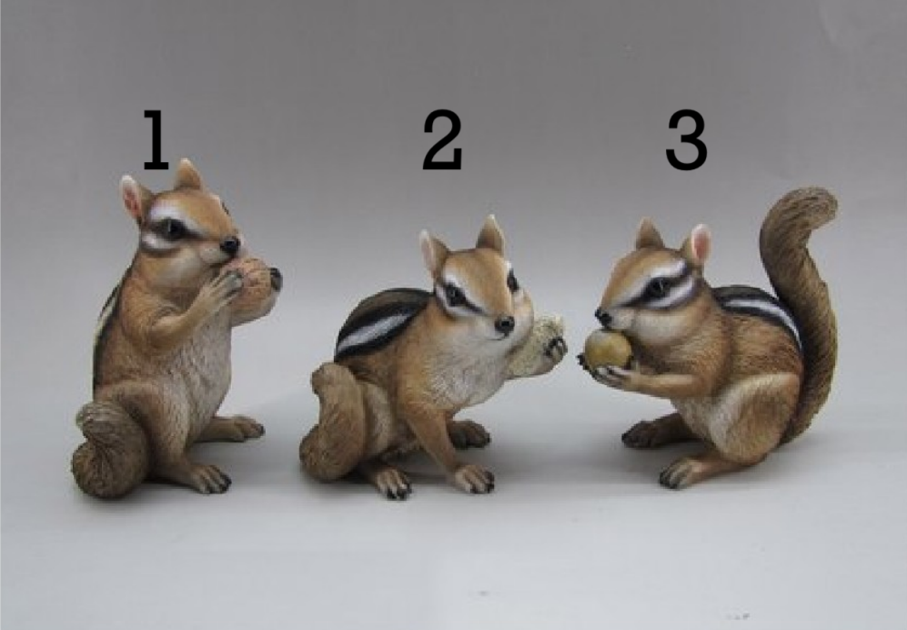 Three toy chipmunks with numbered labels on a gray background