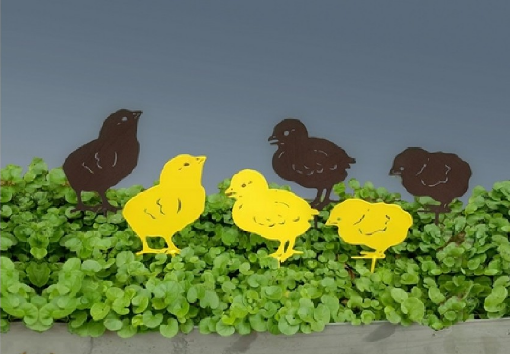 Brown and yellow baby chicken yard stakes, in three poses, looking up, looking forward, and looking down.